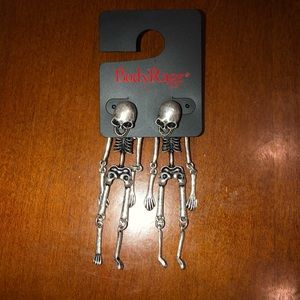 Body Rage skull dangle earrings